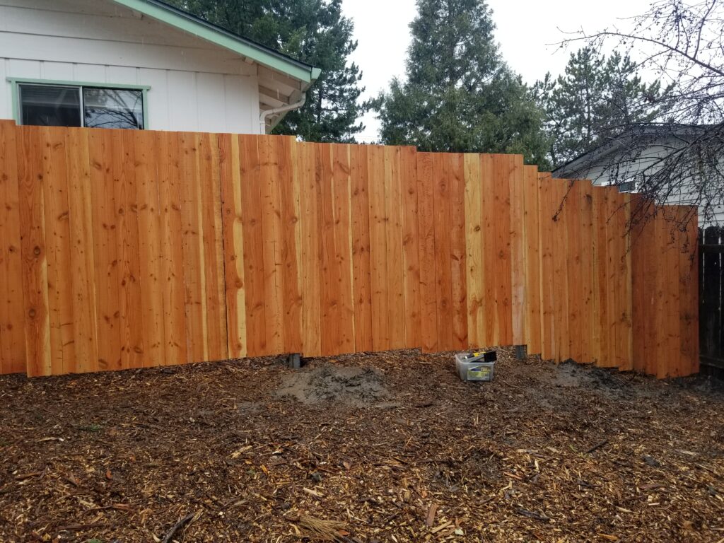 A fence built out of milled wood for a customer